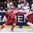 OSTRAVA, CZECH REPUBLIC - MAY 5: Denmark's Julian Jakobsen #33 collides with Belarus' Oleg Yevenko #25 during preliminary round action at the 2015 IIHF Ice Hockey World Championship. (Photo by Andrea Cardin/HHOF-IIHF Images)


